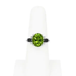 Modern Oval Peridot with Sapphire and Diamond Ring