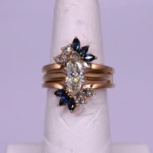 Solitaire Marquise Diamond Engagement Ring with Diamond and Sapphire Wrap-Around
